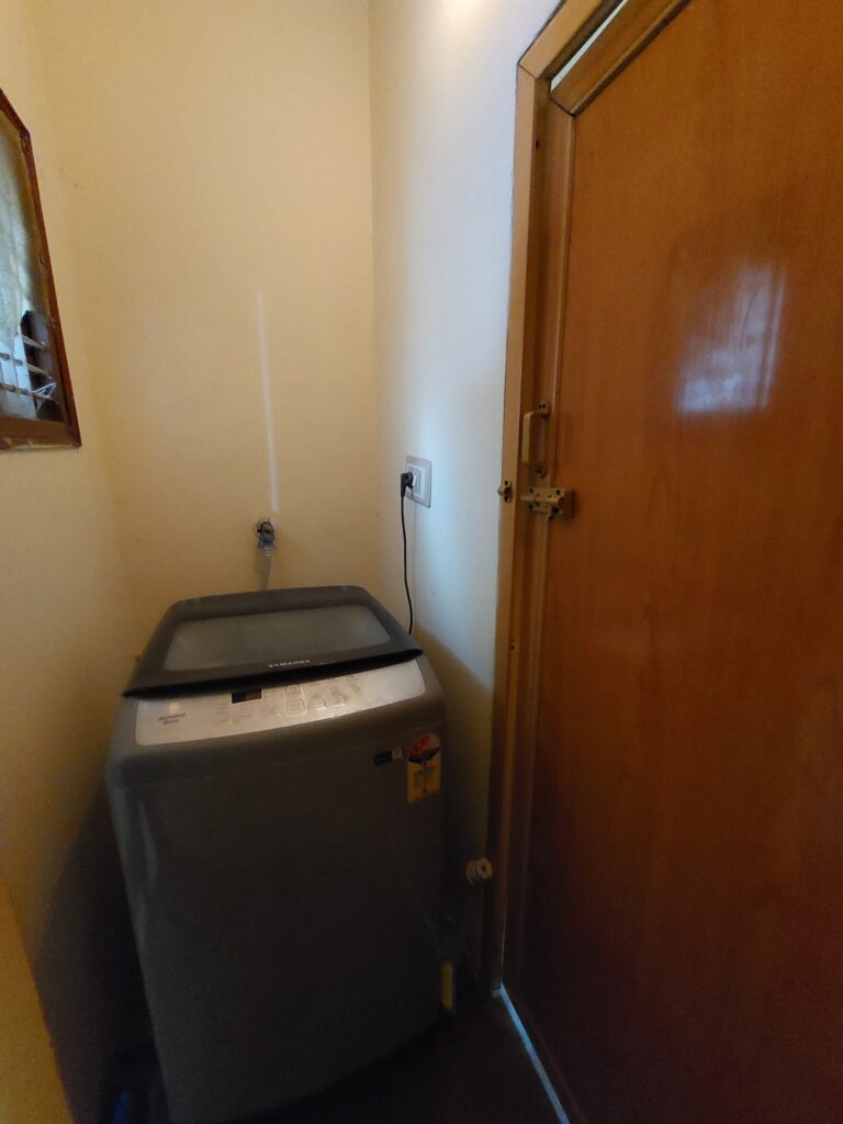 provision for washing machine in 1bhk near bathroom